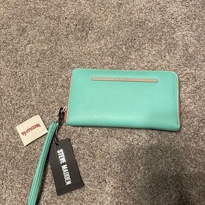 Brand new with tags Steve Madden turquoise and orange clutch.